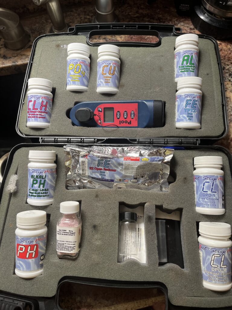 The professional water test kit an owner brings to your home, with reagents for hardness, iron, chlorine and pH